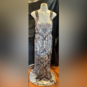 Like New Long Maxi Dress with beautiful design and sequined shoulder straps